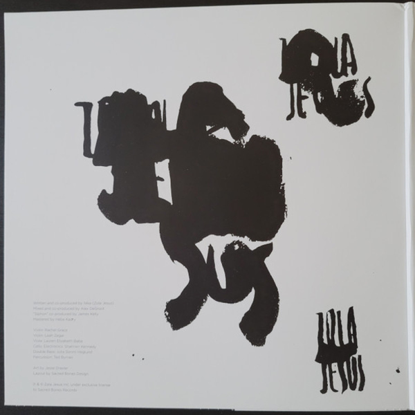 ZOLA JESUS - OKOVI (Clear Black Splatter Vinyl) (Back)
